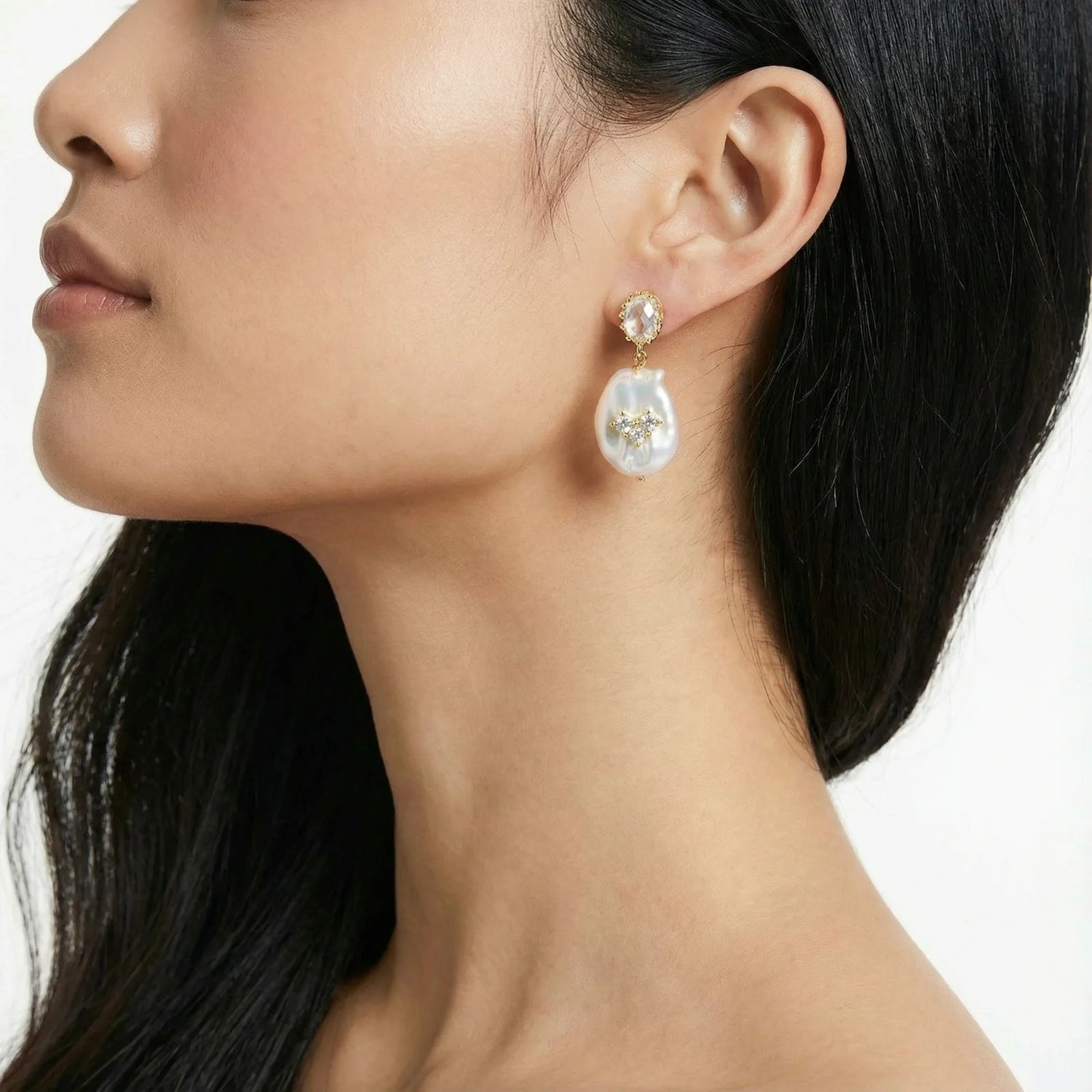 Parel oorbellen met gouden details